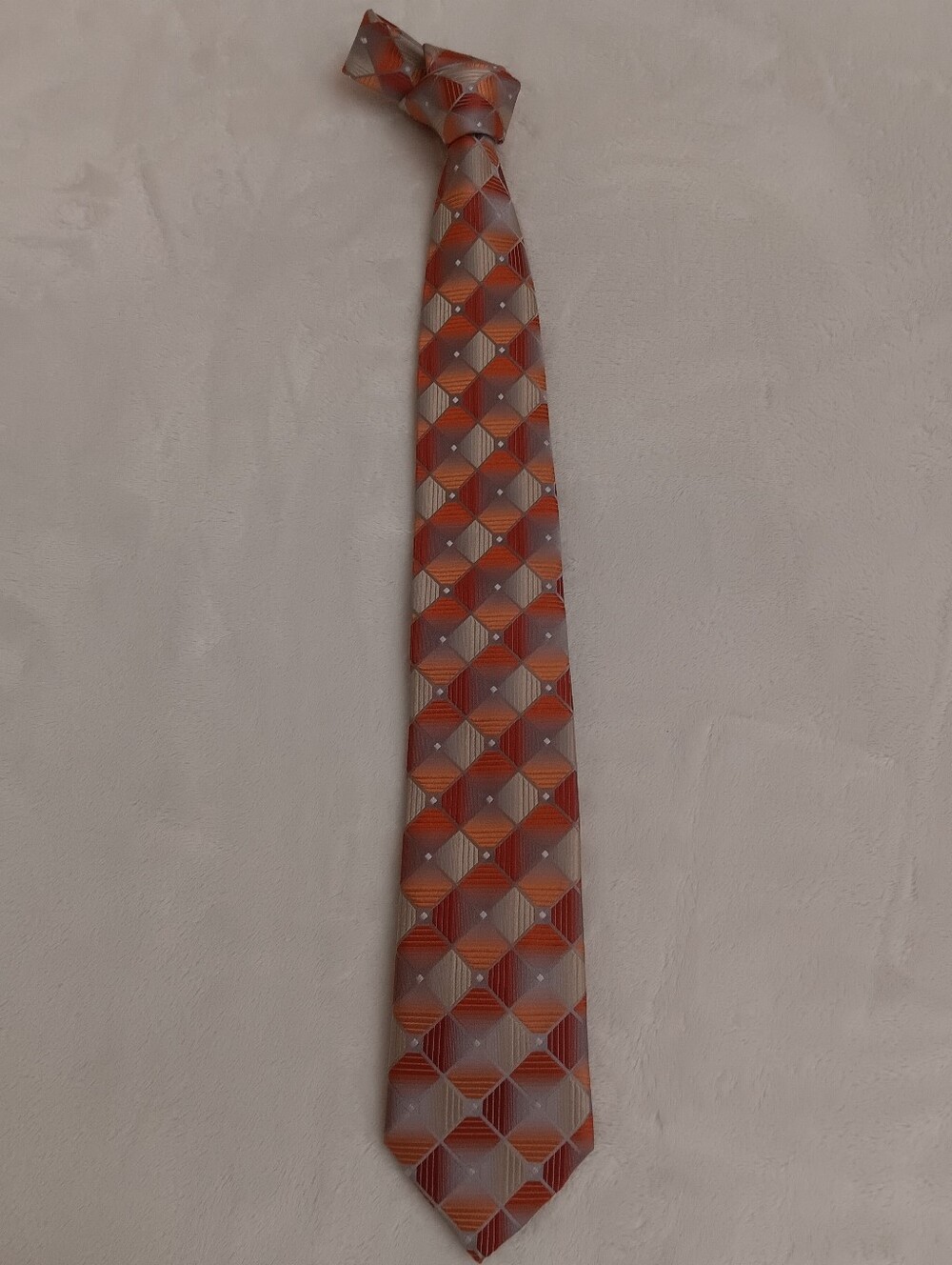 Classic Men's Orange Geometric Tie with Silver Accents